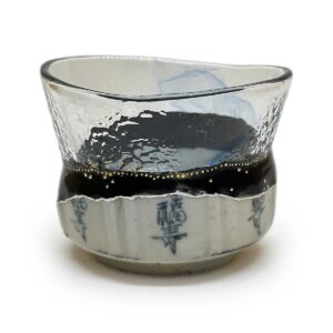 A Cylindrical Tea Bowl Merging Early Imari Shards with Glass